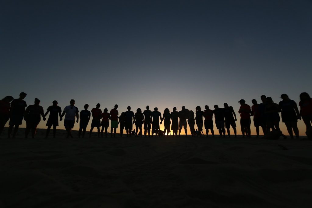 A group of friends standing in a circle